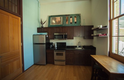 Traverse City Condo | Unique Loft in TC's Historical State Hospital