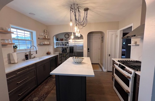 Racine House | Walk to the Waves: Tudor Living Blocks from the Lake & Zoo