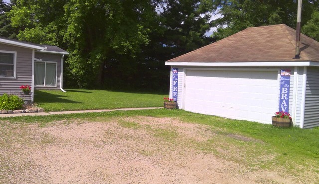 2 bed, 2 bath home on 5 acres with a garage, saltwater pool, firepit, and more!