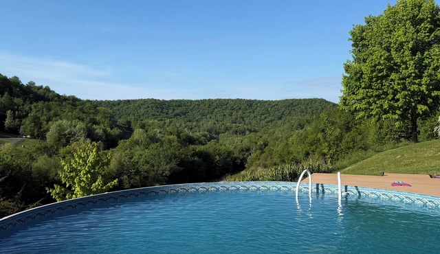 A+ Views & Location Just Minutes From Town w/Heated Infinity Pool on 50+ Acres