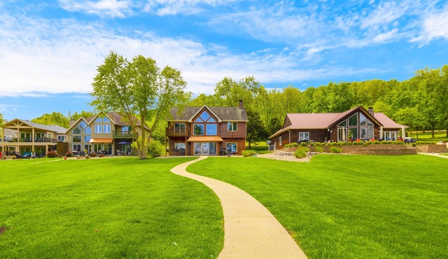 Beautiful Calm Water Lakefront Home, Flat Lot & Large Private Dock.