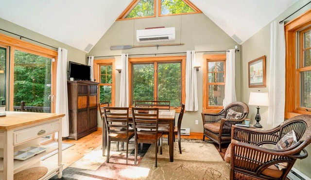 Charming lake cottage with a wet bar, firepit, fast WiFi, & washer/dryer