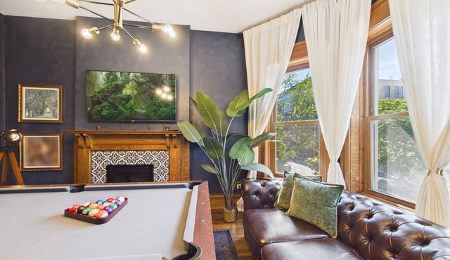 Elite 4BR Art Deco suite. Garage included.