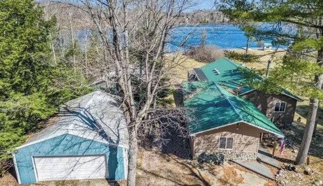 Four-Season Fun at The Birchwood Lodge – Private Dock, Sauna, Trails & Lake View