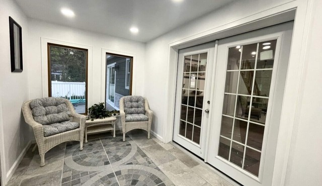 Lake Michigan Retreat. Spacious 4-bedroom home on wooded lot across from lake.