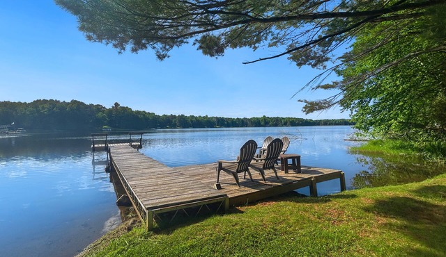 Lakefront 3BR, 2BA cottage with dock, boat, and fire pit