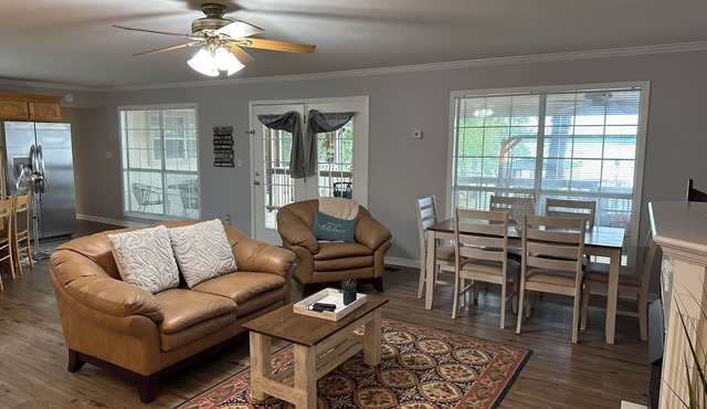 Peaceful lake front home with wrap around porch and relaxing views!