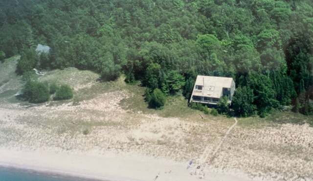 Secluded beachfront cottage in Northport with stunning sunsets on Lake Michigan