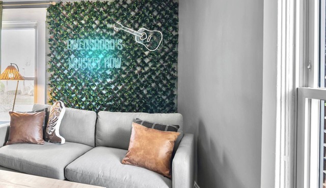 Sip & Stay on Owensboro’s Whiskey Row Stylish 2BR Retreat
