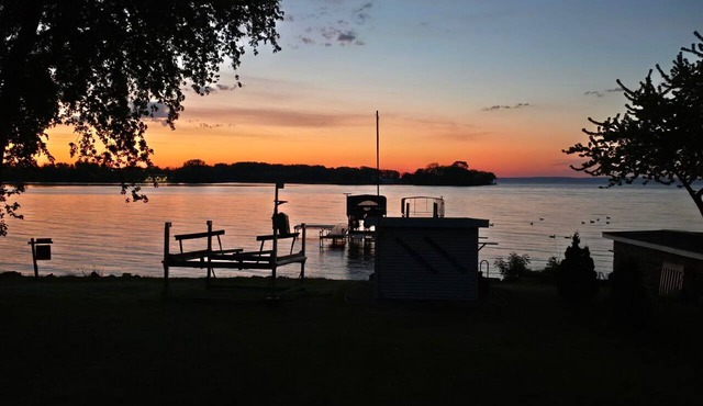 Spacious 4-bedroom Lakefront house in peaceful Oshkosh neighborhood.