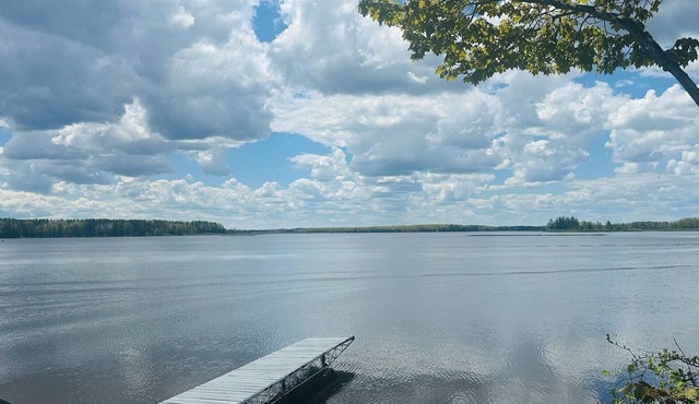 Spacious 4-bedrooms lake front retreat in delightful Alpena area.