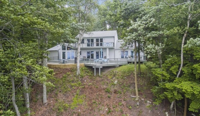 Spacious 5-bedroom house with private access to Lake Michigan beachfront.