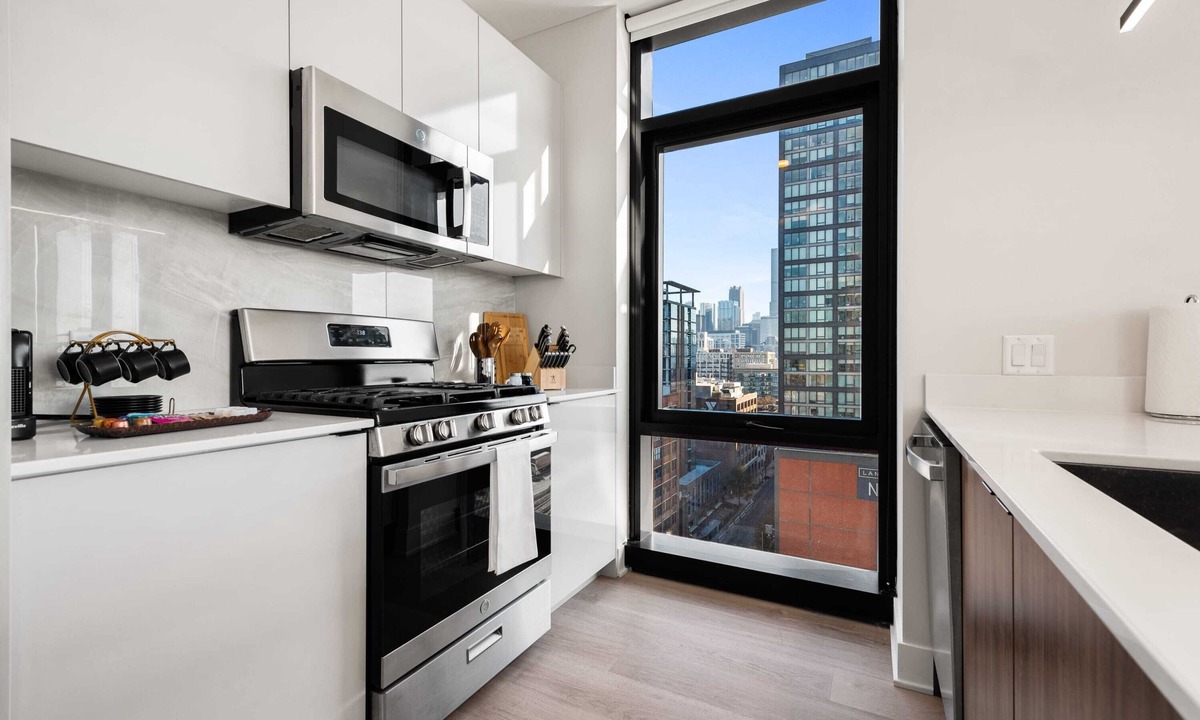 West Loop Apartment | West Loop Scenic Views + Private Balcony Retreat