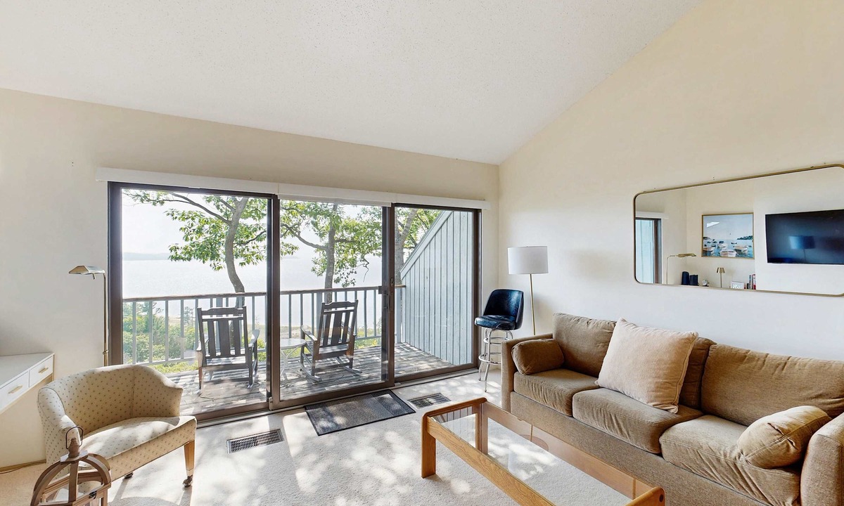 Maple City Condo | Condo in Glen Arbor with Lake Michigan sunset views, fireplace, deck, washer & dryer