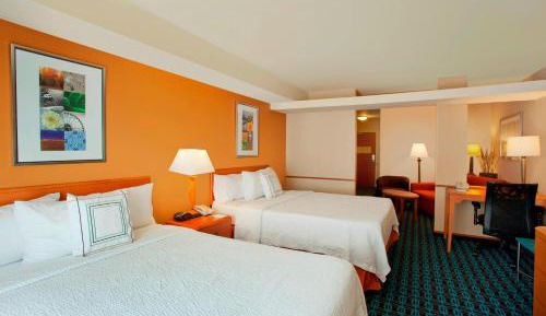 Queen Suite with Two Queen Beds and Sofa Bed