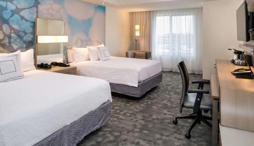 Queen Suite with Two Queen Beds and Sofa Bed