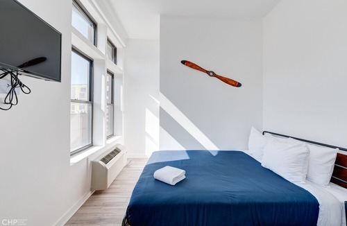 River West Apartment | Feel Comfy And Cozy At This Lovely Chi-town Home Away From Home - 747 Lofts Cabin 308 by RedAwning
