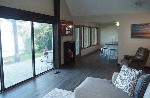Elk Rapids Cottage | A Short's Walk - Sandy Lakefront with Spa/Hot Tub and Kayaks!