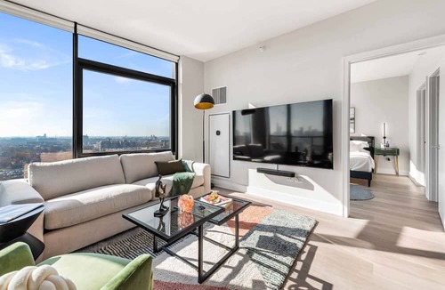 West Loop Apartment | West Loop Scenic Views + Private Balcony Retreat