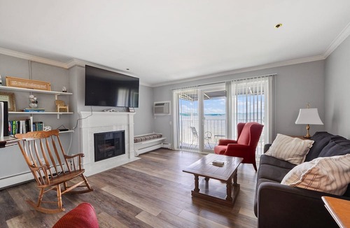Boyne City Condo | 211 Water Street | Private Balcony Above Lake Charlevoix | Fireplace