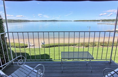 Boyne City Condo | 212 Water Street | Balcony View of Lake Charlevoix | Beach Access |