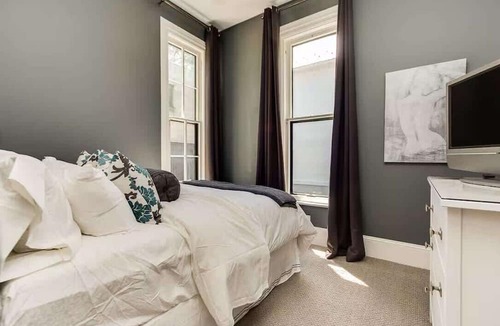 Grand Rapids Apartment | Barlow Suite - Downtown Historic Luxury Gem with Private Parking