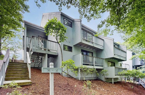 Maple City Condo | Condo in Glen Arbor with Lake Michigan sunset views, fireplace, deck, washer & dryer
