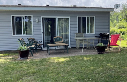 Fremont Cottage | Perfect 2-bedroom cottage in adorable Fremont on a private lake stocked.