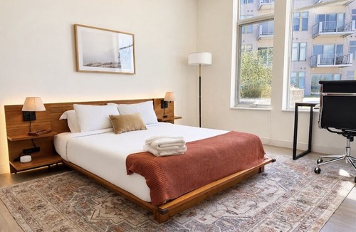 Bay View Apartment | Bay View Designer 1BR · Best Location with Balcony, Gym, and Terrace · Sleeps 4