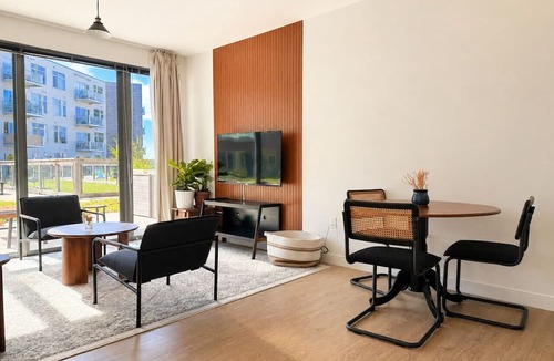 Bay View Apartment | Bay View Designer 1BR · Best Location with Balcony, Gym, and Terrace · Sleeps 4