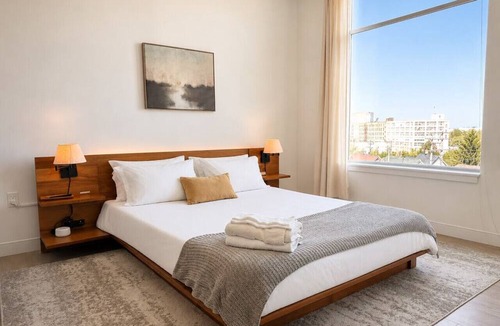 Bay View Apartment | Bay View Designer 2BR · Best Location with Balcony, Gym, and Terrace · Sleeps 6