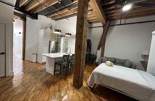 Grand Haven Condo | NEW LISTING DOWNTOWN! Level 1 has a Restaurant, Brewery, Salon & Spa, & More