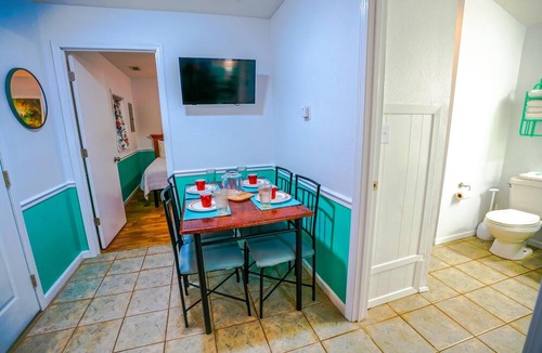 Eddyville Cottage | Heartland Holiday Bungalow - Secluded cabin: 1BR (2Q), 1BA (shower), LR, kitchen, patio, fire pit.