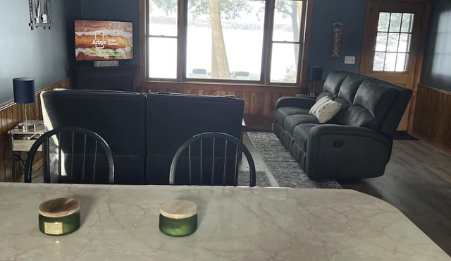 Private Cottage on Manistee Lake with beautiful lake views and sunsets.