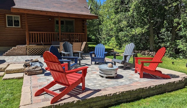 Log Cabin home on the Sturgeon River in Indian River