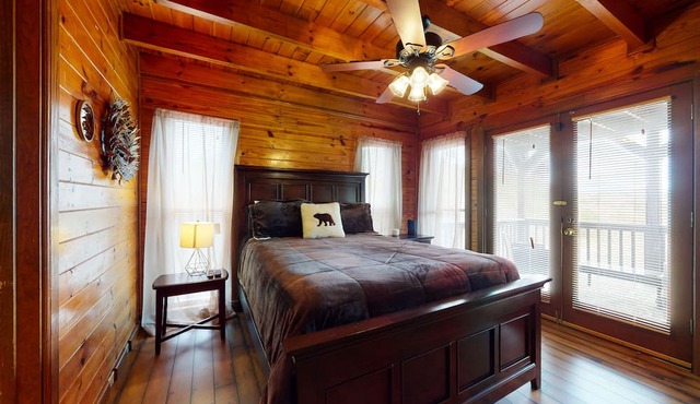 Roomy, three-story mountain home with two full kitchens, game rooms, & AC in Ranger