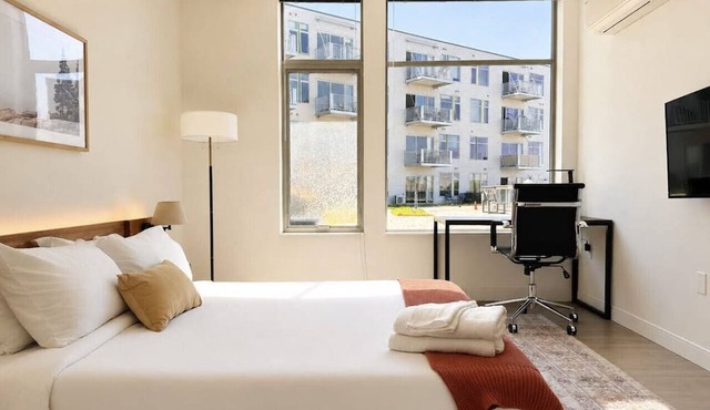 Bay View Designer 1BR · Best Location with Balcony, Gym, and Terrace · Sleeps 4