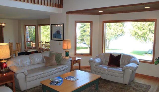 Amazing 6-bedroom, 5K sq. ft, one acre secluded Mullett Lake Beachfront Home