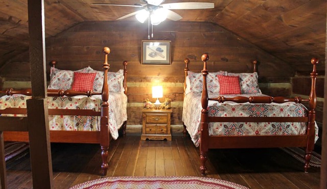 Rustic Retreat, a pre Civil War log cabin. in Lucas